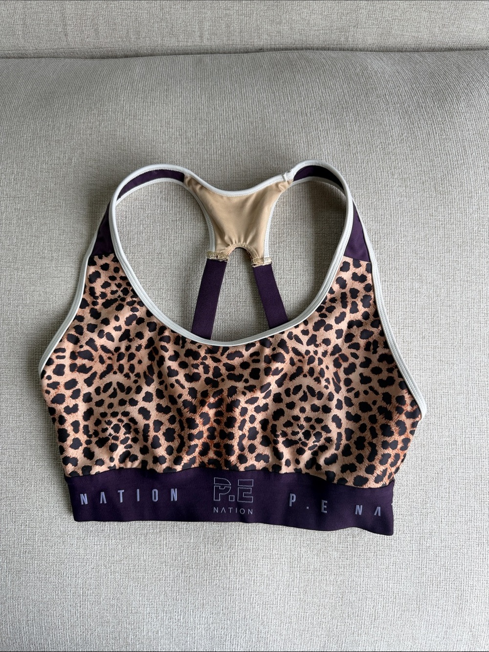 P.E Nation Leopard-Print Racerback Sports Bra in Beige & Purple Trim